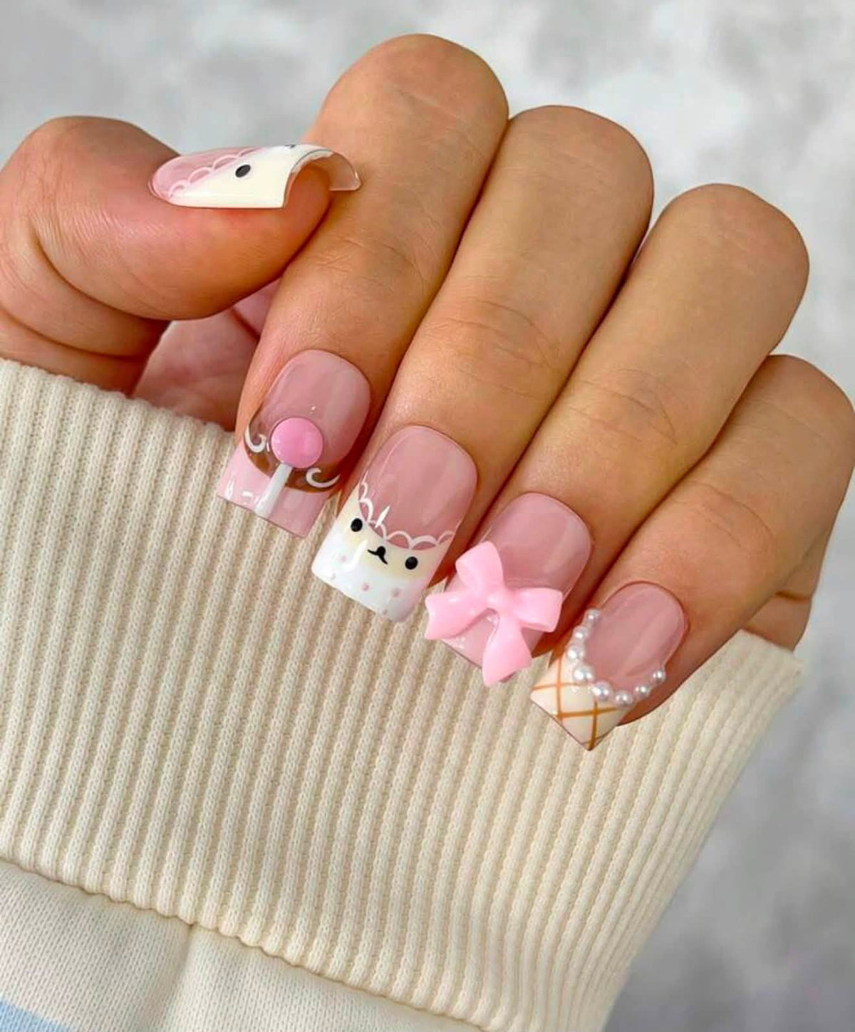 Rilakuma bear-inspired press-on nails